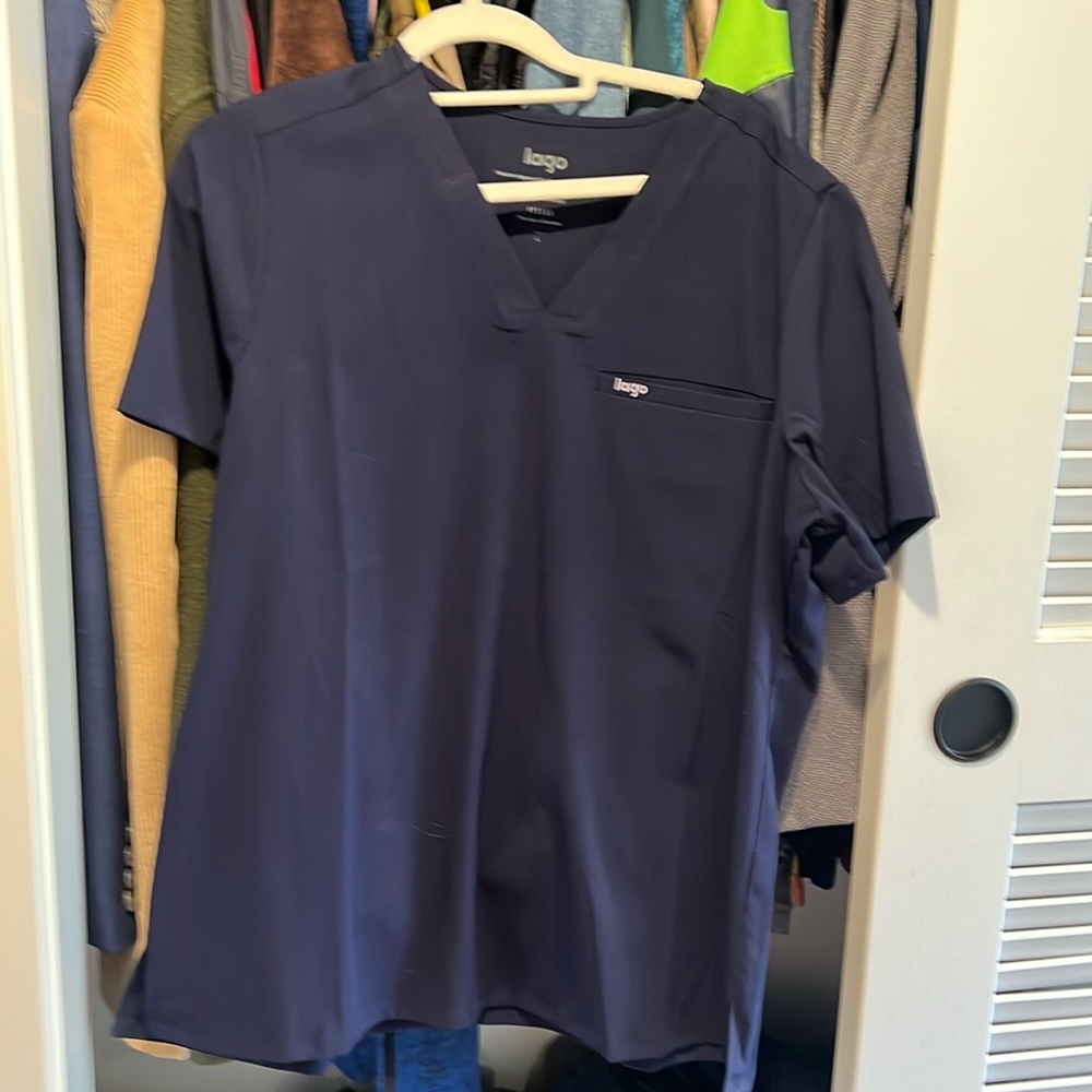 Women’s baby blue scrub top. Lago brand. New no tags